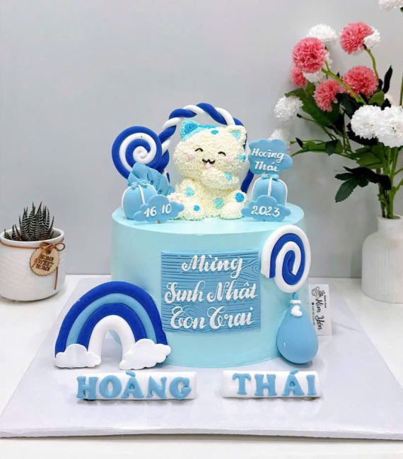 Bánh kem thôi nôi dành cho bé trai tone xanh hot hiện nay 