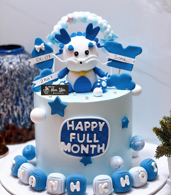 Bánh fondant thôi nôi chủ đề màu xanh