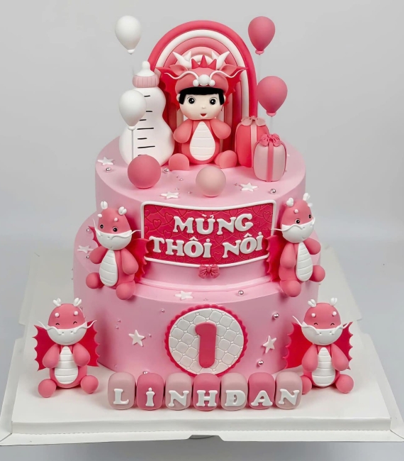 Bánh fondant thôi nôi chủ đề những chú rồng màu hồng