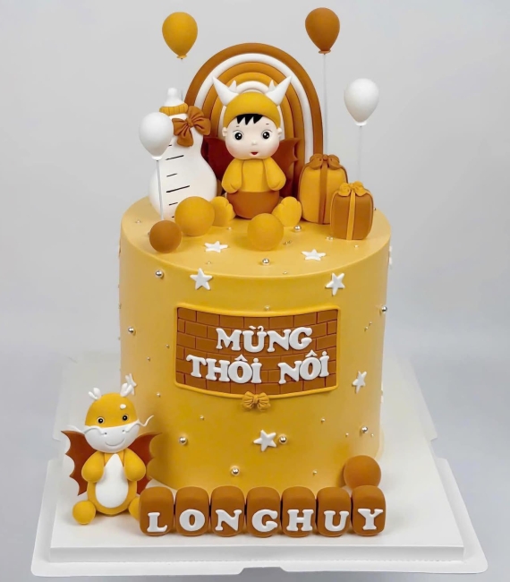 Bánh fondant thôi nôi chủ đề những chú rồng màu vàng