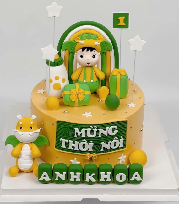 Bánh fondant thôi nôi chủ đề những chú rồng màu vàng xanh
