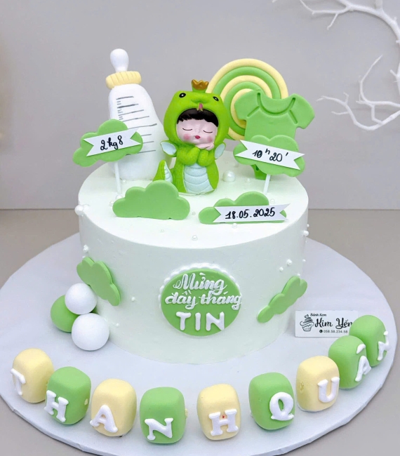 Bánh fondant thôi nôi dành cho bé trai tone xanh cây
