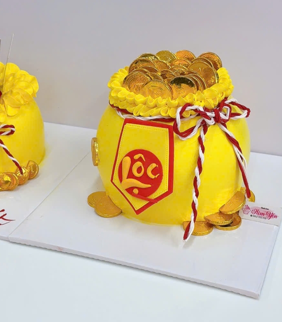Bánh kem hủ vàng cúng thần tài