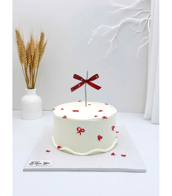 Bánh kem vẻ chibi hình nơ xinh xắn 